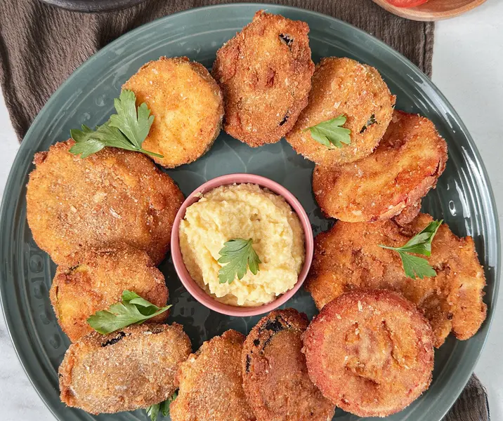 Medallones de verdura con puré de manzana y papas duquesas