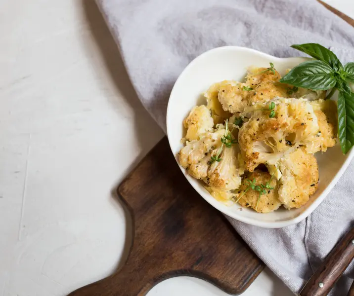 Coliflor con bechamel al pesto