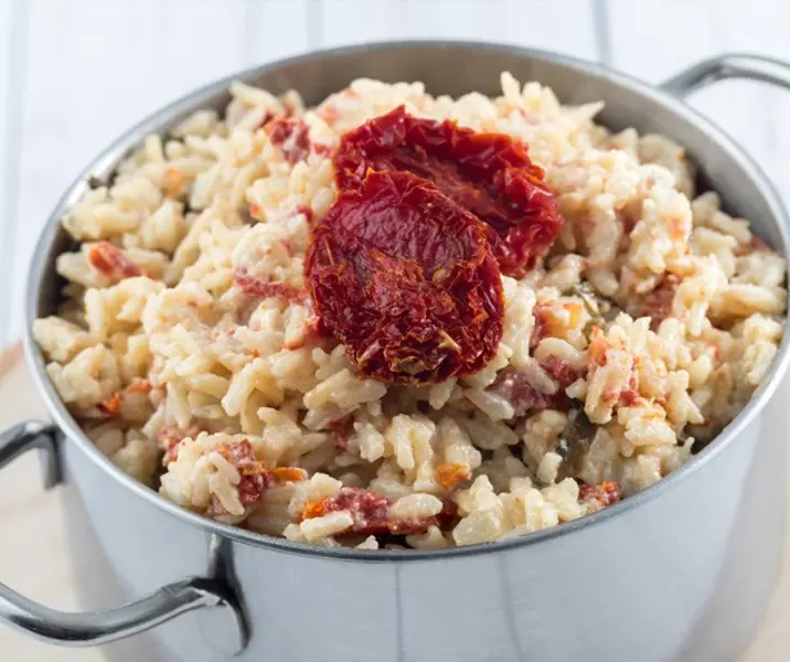 Risotto de champiñones y tomates secos