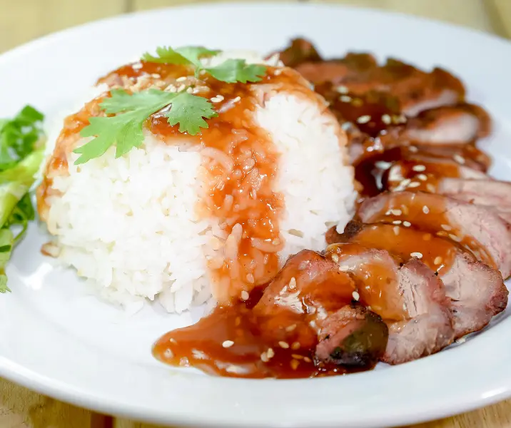 Filete de cerdo con salsa de cítricos y arroz thermomix