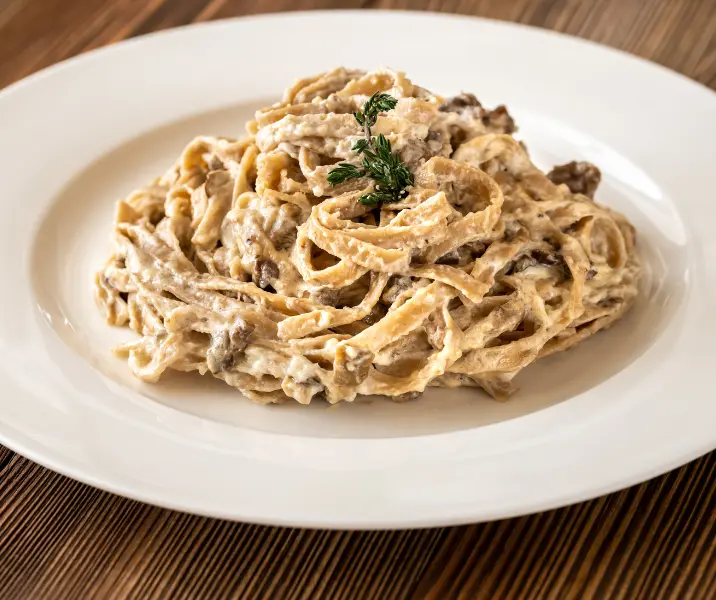 Tallarines con crema, champiñones y choclo sin gluten