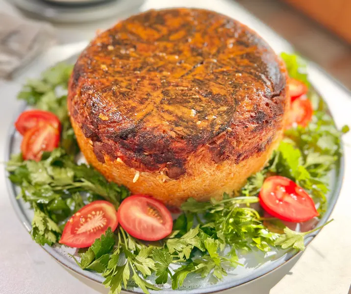 Maqluba de plateada de cerdo al curry