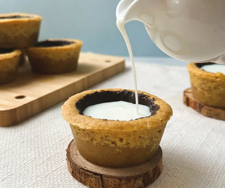 Taza de galleta con leche