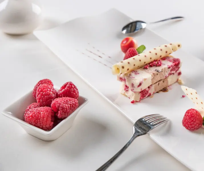 Gratín de frambuesas y chocolate blanco